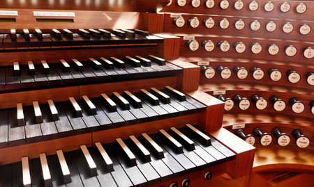 Part of a group of keyboards and stop buttons of a pipe organ, a classical musical instrument
