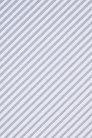 White diagonally ribbed cardboard. Meant as backgroundの写真素材