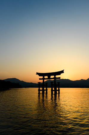 Silhouette of the Torii over the seaの写真素材