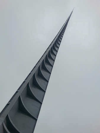 Wroclaw Iglica statue at clean cloudy dayのeditorial素材