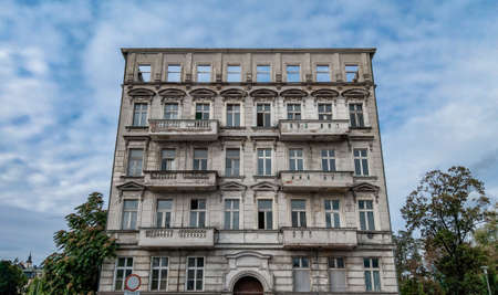 Wroclaw Poland September 23 2018 Old tenement house with trees aroundのeditorial素材