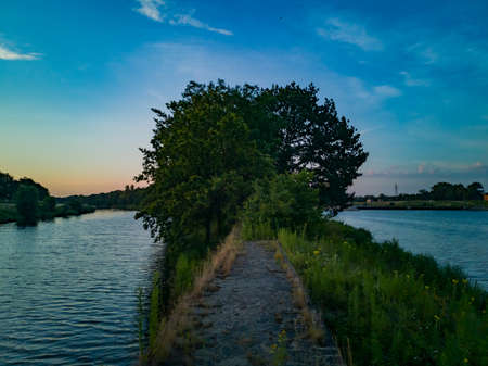 Morning landscape over coasts, islands and peninsula on Odra river in Wroclaw cityの写真素材