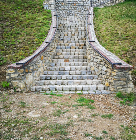 Curvy stone and concrete stairs