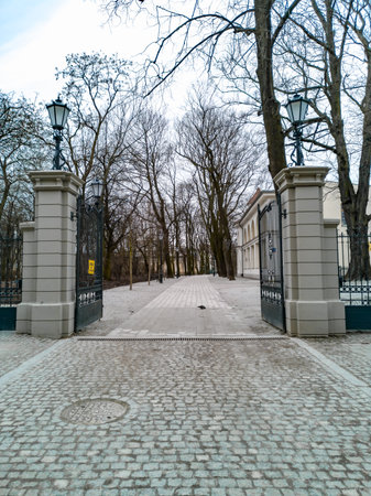 Lodz, Poland - February 22 2020 Small path with gate to small parkのeditorial素材