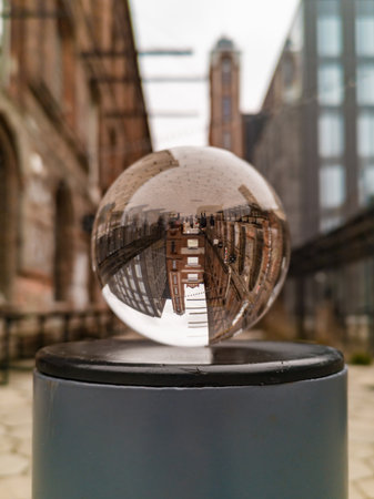 Lodz, Poland - February 23 2020 Long path to Off square reflected in crystal glassy lensballのeditorial素材