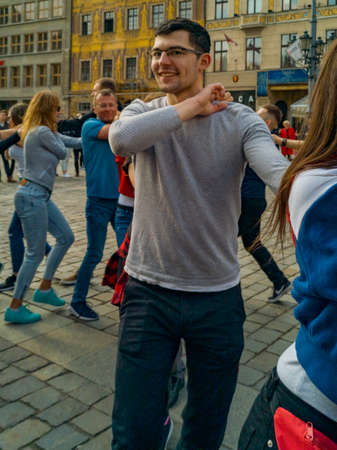 Wroclaw, Poland - March 31 2019 International Flashmob Day of Rueda de Casino and open event at market squareのeditorial素材