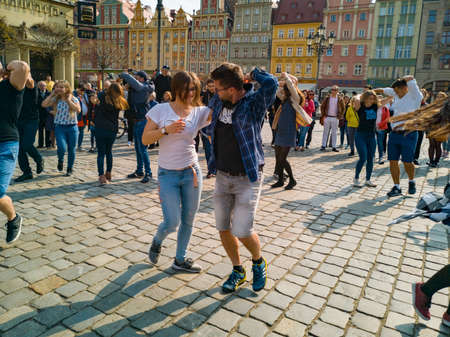 Wroclaw, Poland - March 31 2019 International Flashmob Day of Rueda de Casino and open event at market squareのeditorial素材