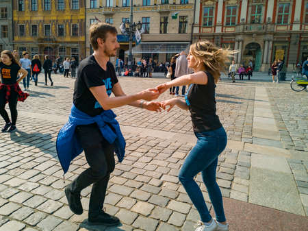 Wroclaw, Poland - March 31 2019 International Flashmob Day of Rueda de Casino and open event at market squareのeditorial素材