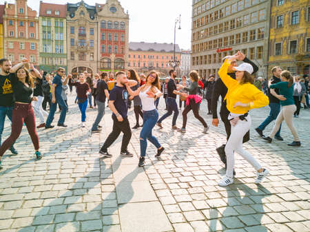 Wroclaw, Poland - March 31 2019 International Flashmob Day of Rueda de Casino and open event at market squareのeditorial素材