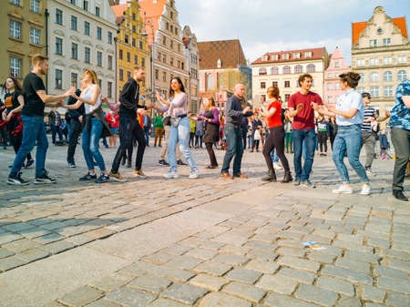 Wroclaw, Poland - March 31 2019 International Flashmob Day of Rueda de Casino and open event at market squareのeditorial素材