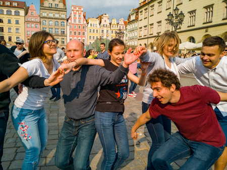 Wroclaw, Poland - March 31 2019 International Flashmob Day of Rueda de Casino and open event at market squareのeditorial素材