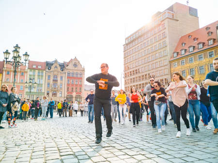 Wroclaw, Poland - March 31 2019 International Flashmob Day of Rueda de Casino and open event with dance animations at market squareのeditorial素材