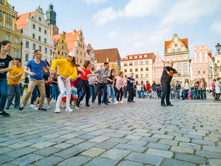 Wroclaw, Poland - March 31 2019 International Flashmob Day of Rueda de Casino and open event with dance animations at market squareのeditorial素材