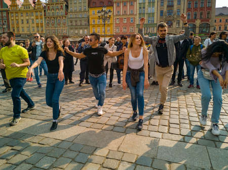 Wroclaw, Poland - March 31 2019 International Flashmob Day of Rueda de Casino and open event at market squareのeditorial素材