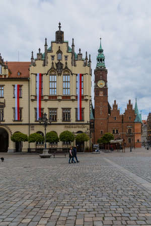 Wroclaw, Poland - May 03 2020: Market square and facade of building with Polish flags at 3rd of Mayのeditorial素材
