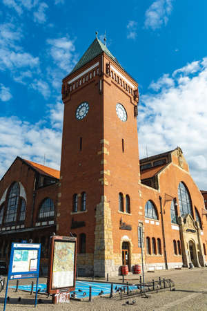 Wroclaw, Poland - May 3 2020: Clock tower of market hall
