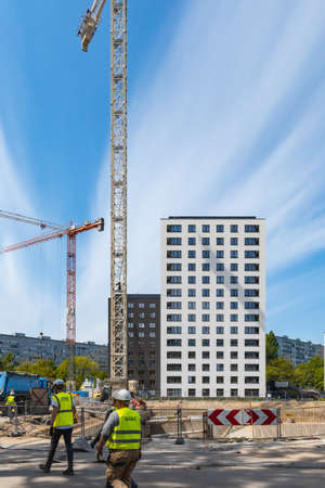 Wroclaw, Poland - May 8 2020: Construction site at New housing estate with black and white buildings