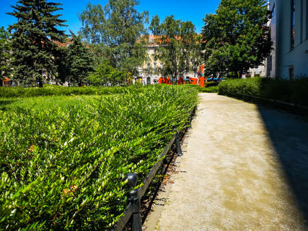 Wroclaw, Poland - May 29 2020: Long sunny path next to Capitol Musical Theater