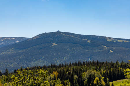 Panorama of Karkonosze Giant Mountains over trees in Szklarska Poreba