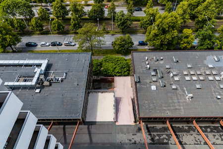 Wroclaw, Poland - June 6 2020: View from balcony of high block of flats to busy street and roofs of low-rise buildingsのeditorial素材
