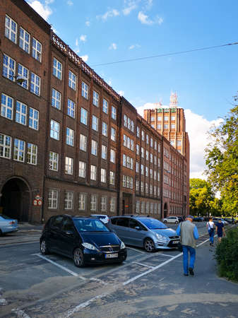 Wroclaw, Poland - July 1 2020: Street view of car parking next to post office building