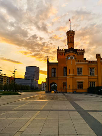 Wroclaw, Poland - September 25 2020: Facade of old building of main railway station at cloudy sunset