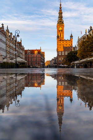 Gdansk, Poland - October 24 2020: Long market square with buildings and town hall with high red...