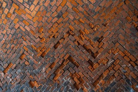 Old wall of tunnel made of old red bricksの写真素材