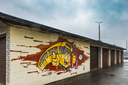 Zawiercie, Poland - April 2021: Street art painting on garages wallsのeditorial素材