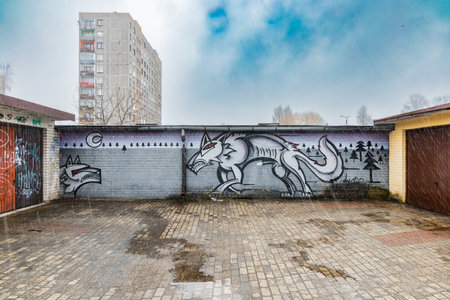 Zawiercie, Poland - April 2021: Street art painting on garages wallsのeditorial素材