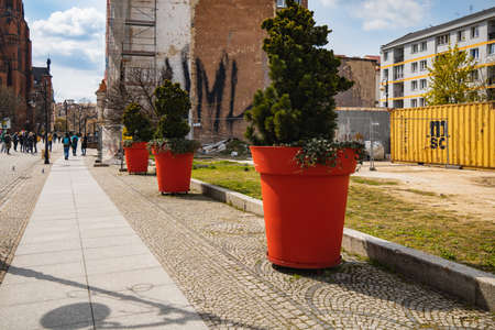 Legnica, Poland - April 2021: Huge colorful flower pots next to cathedral squareのeditorial素材