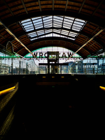 Wroclaw, Poland - June 2021: Closed platforms of main railway station with big city name Wroclaw hanging on the wallのeditorial素材