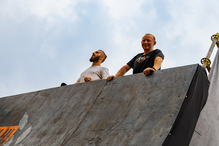 Poznan, Poland - June 2021: An hard extreme obstacle course Survival Race at rainy day