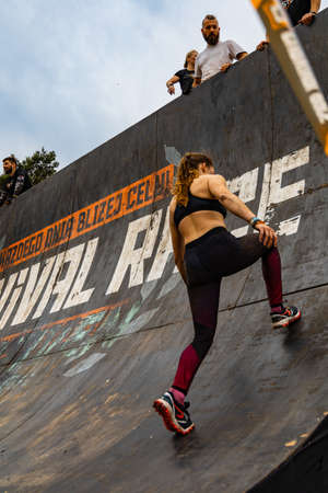 Poznan, Poland - June 2021: An hard extreme obstacle course Survival Race at rainy dayのeditorial素材