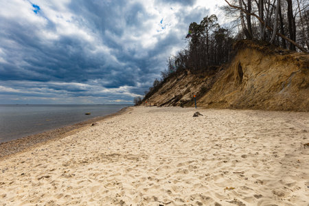 Coast of Baltic sea at the small beach next to high cliffsの写真素材