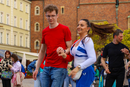 Wroclaw, Poland - April 2022: A lot of people dancing Rueda de Casino open event at market squareのeditorial素材