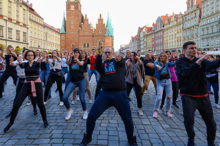 Wroclaw, Poland - April 2022: A lot of people dancing Rueda de Casino open event at market squareのeditorial素材