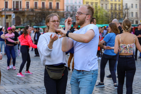 Wroclaw, Poland - April 2022: A lot of people dancing Rueda de Casino open event at market squareのeditorial素材