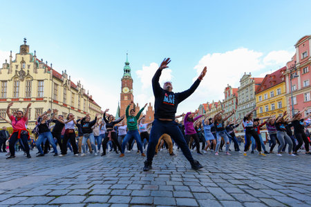 Wroclaw, Poland - April 2022: A lot of people dancing Rueda de Casino open event at market squareのeditorial素材