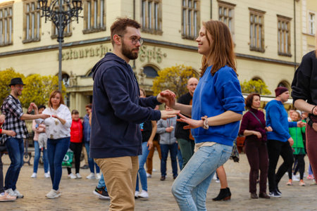 Wroclaw, Poland - April 2022: A lot of people dancing Rueda de Casino open event at market squareのeditorial素材