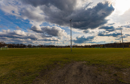 Wroclaw, Poland - April 2022: Big landscape panorama of entrance to big football pitch square at...