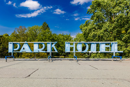 Wroclaw, Poland - June 2022: A signboard with a logo on the roof of the historic Park Hotel, which is part of the training center of the state labor inspectionのeditorial素材