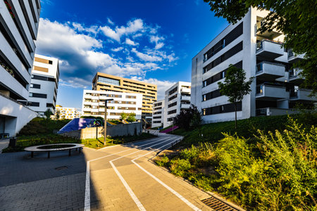 Poznan, Poland - July 2022: A very colorful backyard with a large and colorful playground and a...