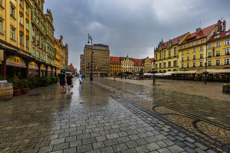 Wroclaw, Poland - July 2022: Wroclaw market square at cloudy and rainy afternoonのeditorial素材