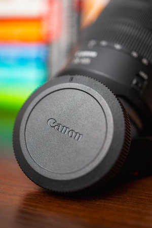Wroclaw, Poland - August 17 2023: Camera lens cap of Canon RF lens next to RF 24-105mm f4 lens on...