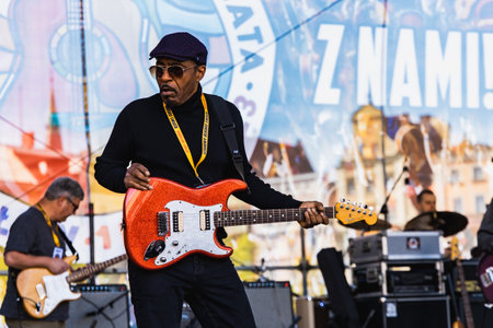 Wroclaw, Poland - May 1 2023: Artists and guitarists at main stage at open event Guitar Guinness World Record 2023 where record was beaten with 7967 guitars at market squareのeditorial素材