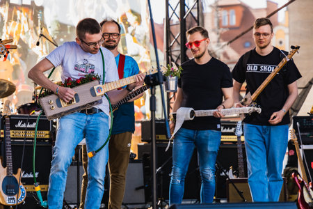 Wroclaw, Poland - May 1 2023: Participants with guitars at open event Guitar Guinness World Record...