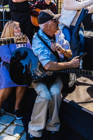 Wroclaw, Poland - May 1 2023: Participants with guitars at open event Guitar Guinness World Record...
