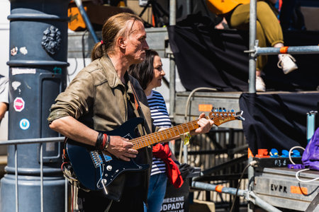 Wroclaw, Poland - May 1 2023: Participants with guitars at open event Guitar Guinness World Record...