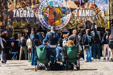 Wroclaw, Poland - May 1 2023: Participants with guitars at open event Guitar Guinness World Record...